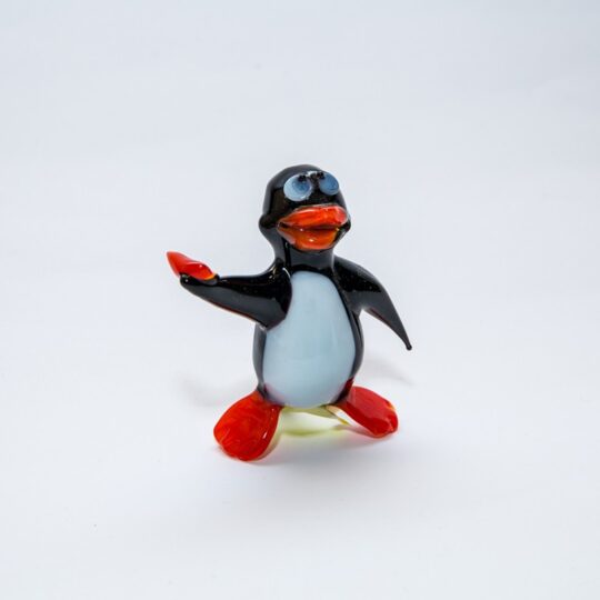 Penguin Throwing Pepper Figurine