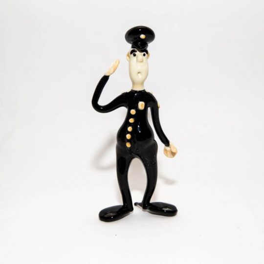 Police Officer Saluting Figurine
